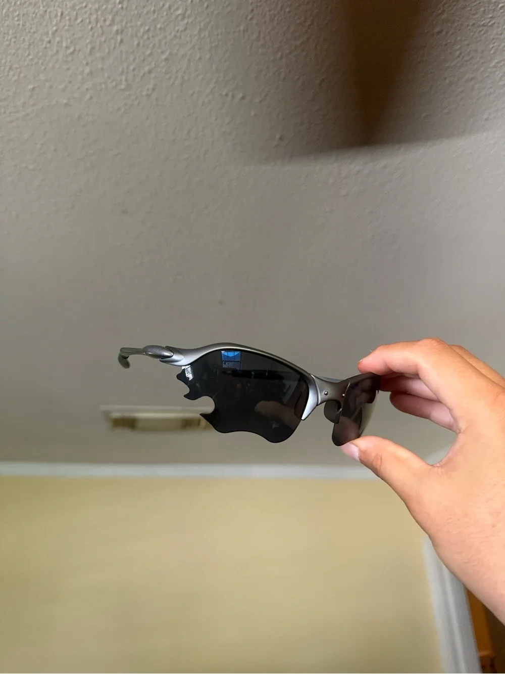 Sporty Flame-Style Sunglasses in Gunmetal with Dark Lenses Oakley